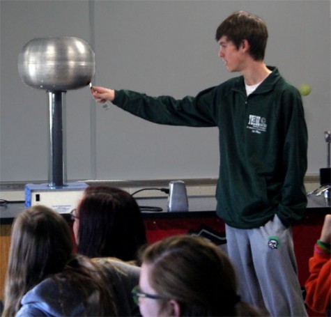 During Mr. Repas 2nd period physics class, Jimmy Wiltzuis voluntarily takes the front to test out the Van De Graff Generator's strength.