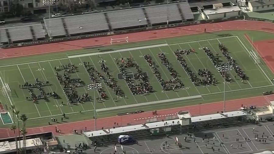 Las Angeles students spell out #enough during walk out protest against gun violence. 