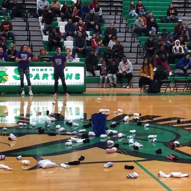 All the socks that were thrown onto the court during the paint the gym purple game.