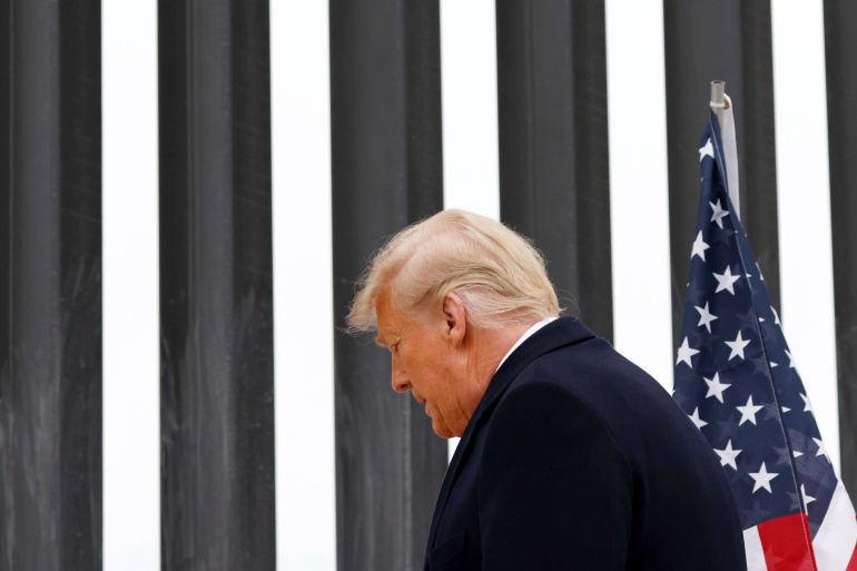 U.S. President Donald Trump visits the U.S.-Mexico border wall, in Alamo, Texas, U.S., January 12, 2021. REUTERS/Carlos Barria