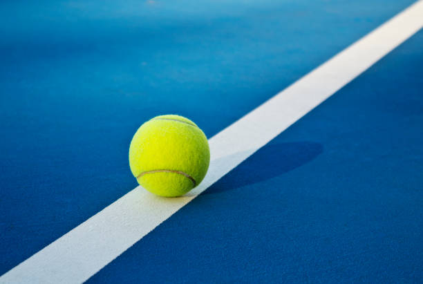 Tennis game. Tennis balls on the tennis court. Sport, recreation concept