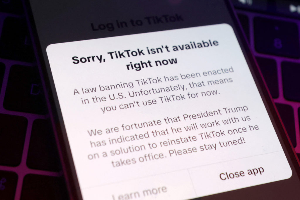 TikTok app with the message "Sorry, TikTok isn't available right now" are seen in this illustration taken, January 19, 2025. REUTERS/Dado Ruvic/Illustration